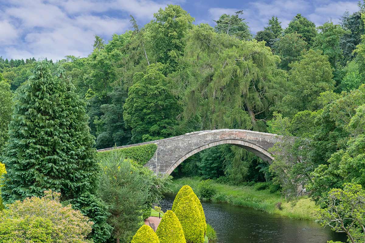 Robert Burns was born in Alloway in Ayr. His poems often mentioned places from his local area such as The Auld Brig as featured in this image . Many of his poems are recited at a Burns supper.